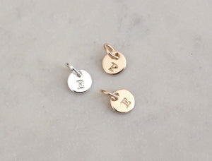 Tiny initial charm 1/4" (6.4mm) 20 ga
