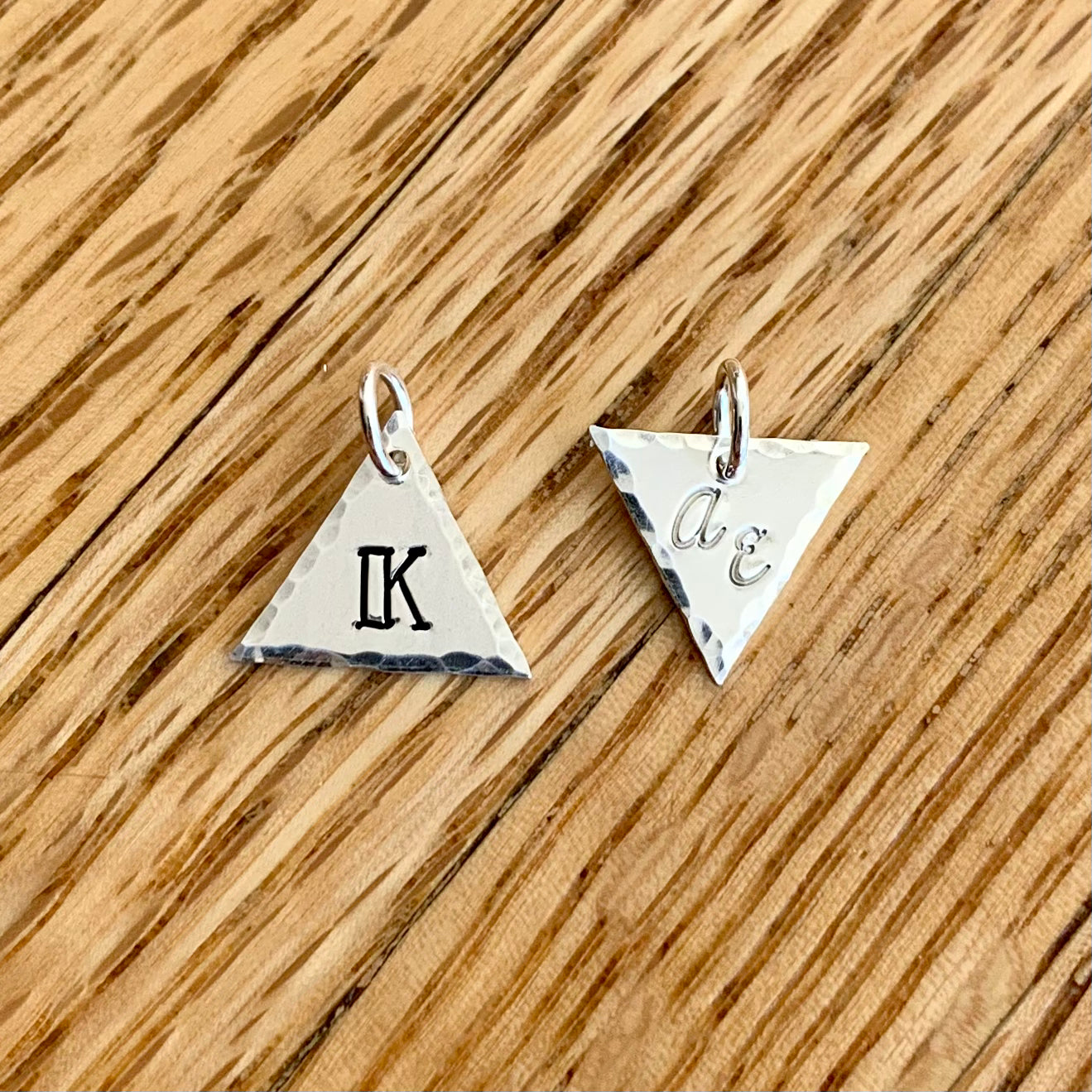 Geometric triangle initial charm in sterling silver, 1/2"